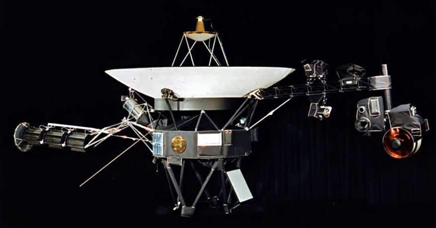 a case with a gold plate mounted in the fuselage of the Voyager 2 probe
