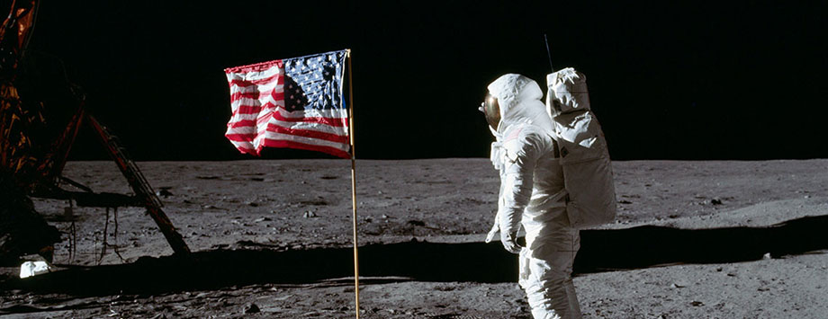 American flag and astronaut on the Moon