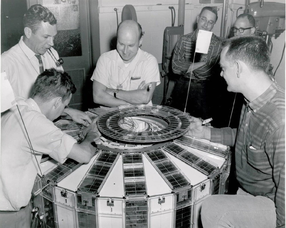 NASA engineers with the Transit-4A satellite